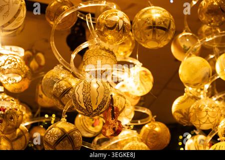 Lovely Christmas Card with Lots of Yellow Christmas Tree Balls. Stock Photo