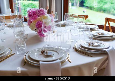 An elegantly decorated banquet table at an event. Wedding decoration. Stock Photo