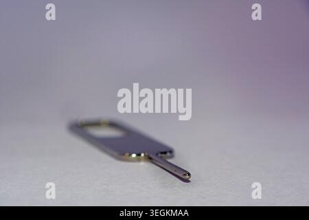 close up of Nano sim card ejector on white background Stock Photo