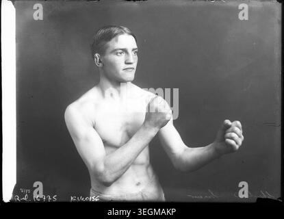 Photographer unknown. Boxer Christian poses in 1911, documenting early 20th-century French boxing, athletic training, and sports culture. Press photograph. Stock Photo