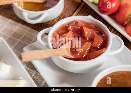 Rich Mediterranean Breakfast Served Outdoors, Abundant Traditional Turkish Breakfast with Fresh Bread, Cheese, Olives, Eggs and Seasonal Ingredients Stock Photo