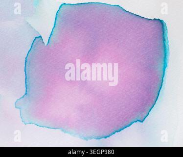 A watercolor abstraction with soft shapes using pink and blue colors. It highlights the beauty of fluid blending found in paint. The composition is si Stock Photo
