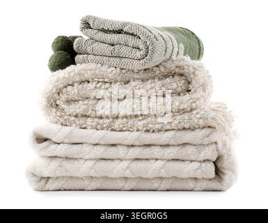 Stack of different cozy blankets isolated on white background Stock Photo