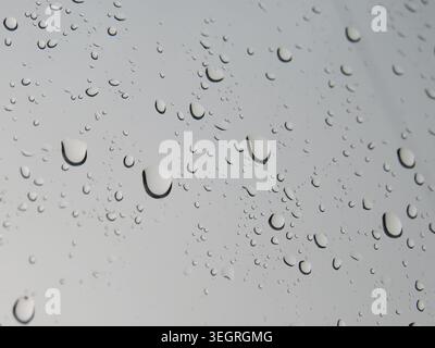 Raindrops on the window during rain Stock Photo