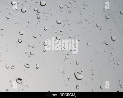 Raindrops on the window during rain Stock Photo