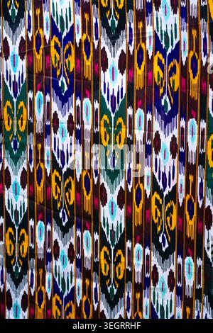 Background, fabric texture with a pomegranate pattern. Concept: interior, cosmetics packaging, textile prints Stock Photo
