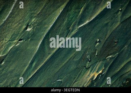 Abstract green oil paint texture with diagonal brush strokes and pattern Stock Photo