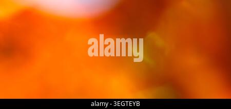 Warm deep orange and brown abstract gradient background with golden accent and copy space Stock Photo