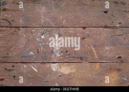 Old weathered wooden planks texture with scratches marks and rustic vintage background Stock Photo