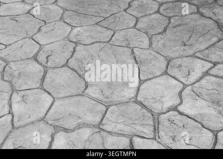 Detailed stone pavement texture pattern concrete background showing solid cobble rock surface creating calm and stable feeling for outdoor architectur Stock Photo