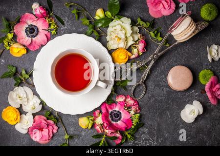 Various flowers on black background. Overhead view with copy space Stock Photo