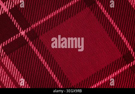 Close-up of red and maroon checkered fabric texture with tartan pattern Stock Photo
