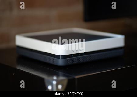 Modern wireless router modem device providing high-speed internet connection Stock Photo