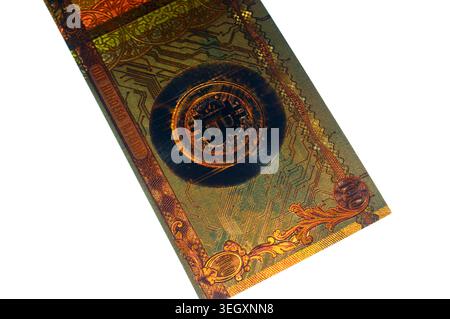 Cairo, Egypt, May 14 2026: the reverse side of gold plated novelty 100 bitcoin BTC note, features Bitcoin symbol on circuit board, cryptocurrency and Stock Photo