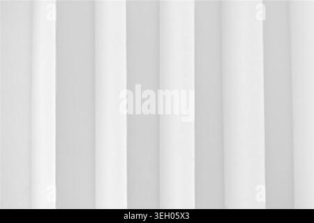 Abstract white paper background with vertical accordion folds. Minimalist geometric texture for corporate branding and modern web header design. Stock Photo