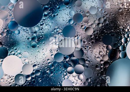 Blue And Teal Droplets With Reflections. Scientific Artistic Scene Of Oil Beads With Soft Background Stock Photo