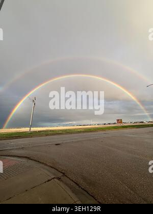Double Rainbow Over Suburban Houses Stock Photo