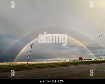 Double Rainbow Over Suburban Houses Stock Photo