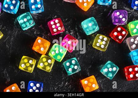 Colorful game dices on black background Stock Photo