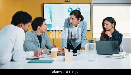 Business people, meeting and discussion with statistics for performance review or company revenue. Group, employees or colleagues with graph, chart or Stock Photo