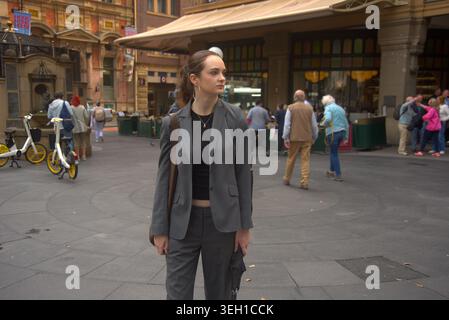 Smart young woman in the city Stock Photo