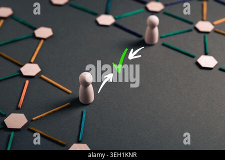 Conceptual image of successful communication between two networks with check mark symbol, representing data exchange, connectivity, and collaboration. Stock Photo