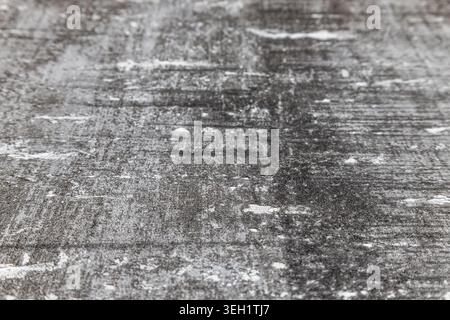 Dark distressed grunge texture background with scratches Stock Photo