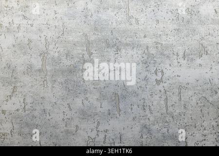 Textured gray wallcovering with distressed plaster pattern Stock Photo