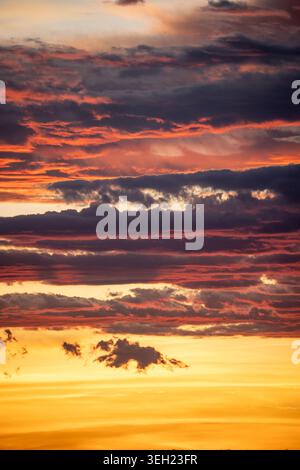 Dramatic Sunset Clouds Over Horizon Stock Photo
