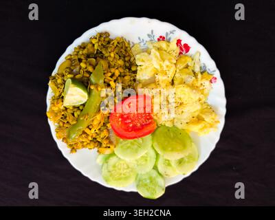 homemade nutritious food plates with scrambled eggs salad and sprouted moong beans Stock Photo
