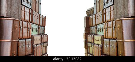 Multi-colored old suitcases on an isolated white background. World tourism, travel. Banner. Copyspace Stock Photo