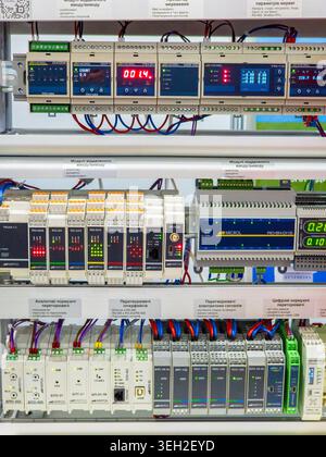 Ukraine, Kyiv - May 12, 2026:A close-up view of a professional industrial control cabinet featuring various automation modules, programmable logic con Stock Photo