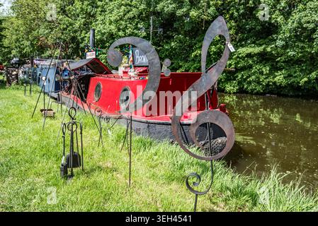 Working blacksmith and sales point on  the Leeds and Liverpool canal at Gargrave, North Yorkshire. Stock Photo