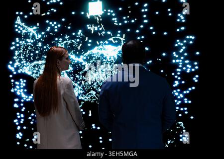 Engineering team implementing machine learning algorithms for AI system, working together. Tech startup colleagues discuss about artificial intelligence neural network architecture Stock Photo
