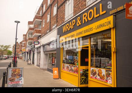xLONDON - APRIL 9, 2026: BLOEMFONTEIN ROAD W12 – Wrap and Roll kebab and burger takeaway Stock Photo