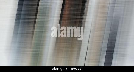 Abstract background with diagonal bands of black, grey, and brown, featuring a fine linen fabric texture overlay. Stock Photo