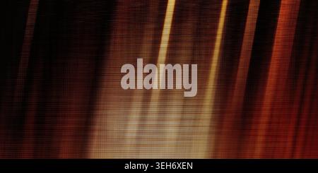 An abstract background featuring warm, glowing golden light beams cutting through a dark, textured surface with a fine woven or fabric-like pattern. Stock Photo