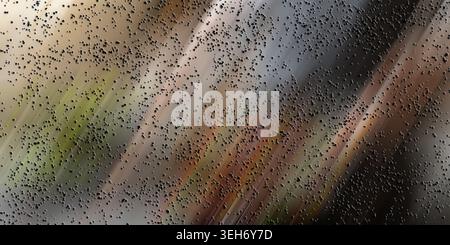 An abstract digital art background featuring a dark, moody, and earthy gradient with a scattering of small black particles creating a textured effect. Stock Photo