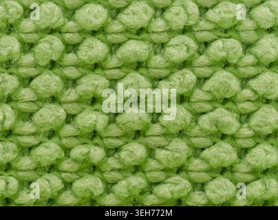 Extreme macro photography of a green microfiber cloth texture showing individual fiber loops Stock Photo