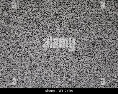 Rough Concrete Surface With Granular Texture, Industrial Grey Tones, Closeup Detail Showing Aggregate Stock Photo
