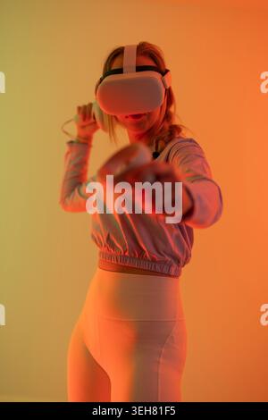 Woman immersed in virtual reality Stock Photo