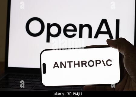 Claude OpenAI and Anthropic Logos on Laptop Smartphone and Printed Sheet. Chennai, Tamil Nadu, India 08 May 2026 Stock Photo