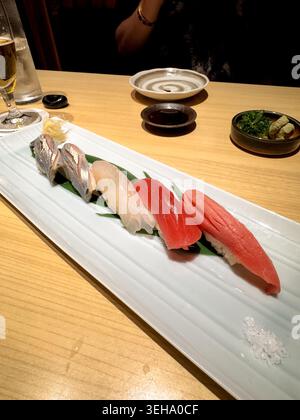 Assorted sushi and Japanese cuisine served at a restaurant in the Ginza district of Tokyo, Japan. Stock Photo