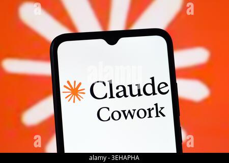 In this photo illustration, the Claude Cowork logo is seen displayed on a smartphone screen. Stock Photo