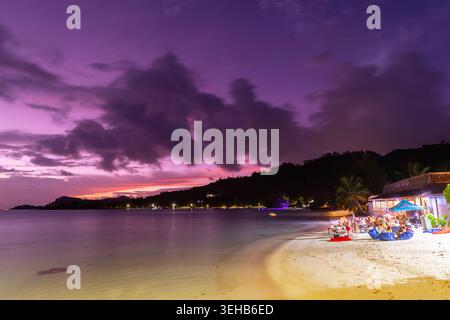 Matira Point and the Bora Bora Beach Club at twiight on Bora Bora Island in French Polynesia. Stock Photo