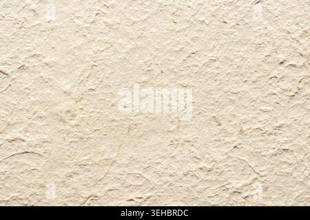 Vintage handmade paper texture background with organic fibers full frame macro view Stock Photo