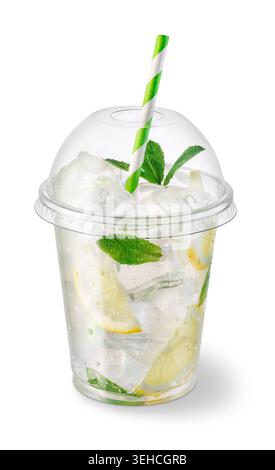 Lemonade or mojito style drink with lemon slices, ice cubes and fresh mint in clear takeaway plastic cup on white background Stock Photo