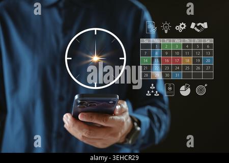 Management of digital interface for time schedule calendar planning helps productivity management in workplace, while organizing efficient project man Stock Photo