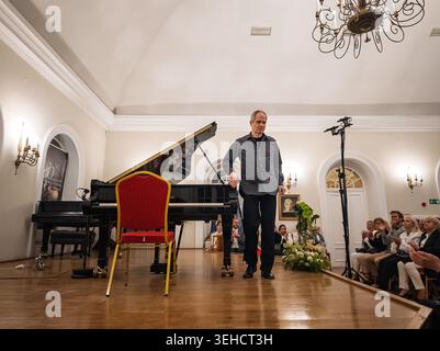 Pianist Piotr Anderszewski walks on the stage at the 80th International Chopin Festival in Duszniki‑Zdrój, the oldest piano festival in the world. Stock Photo