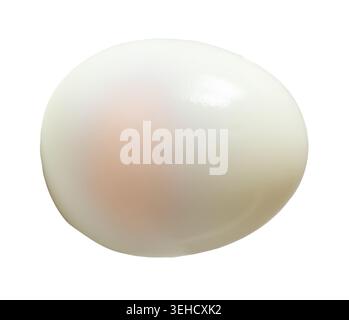 Unpeeled cooked or boiled egg with egg yolk is isolated on white background with clipping path. Stock Photo